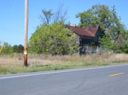 Old house on Route 37, near a corner. Before Redwood.